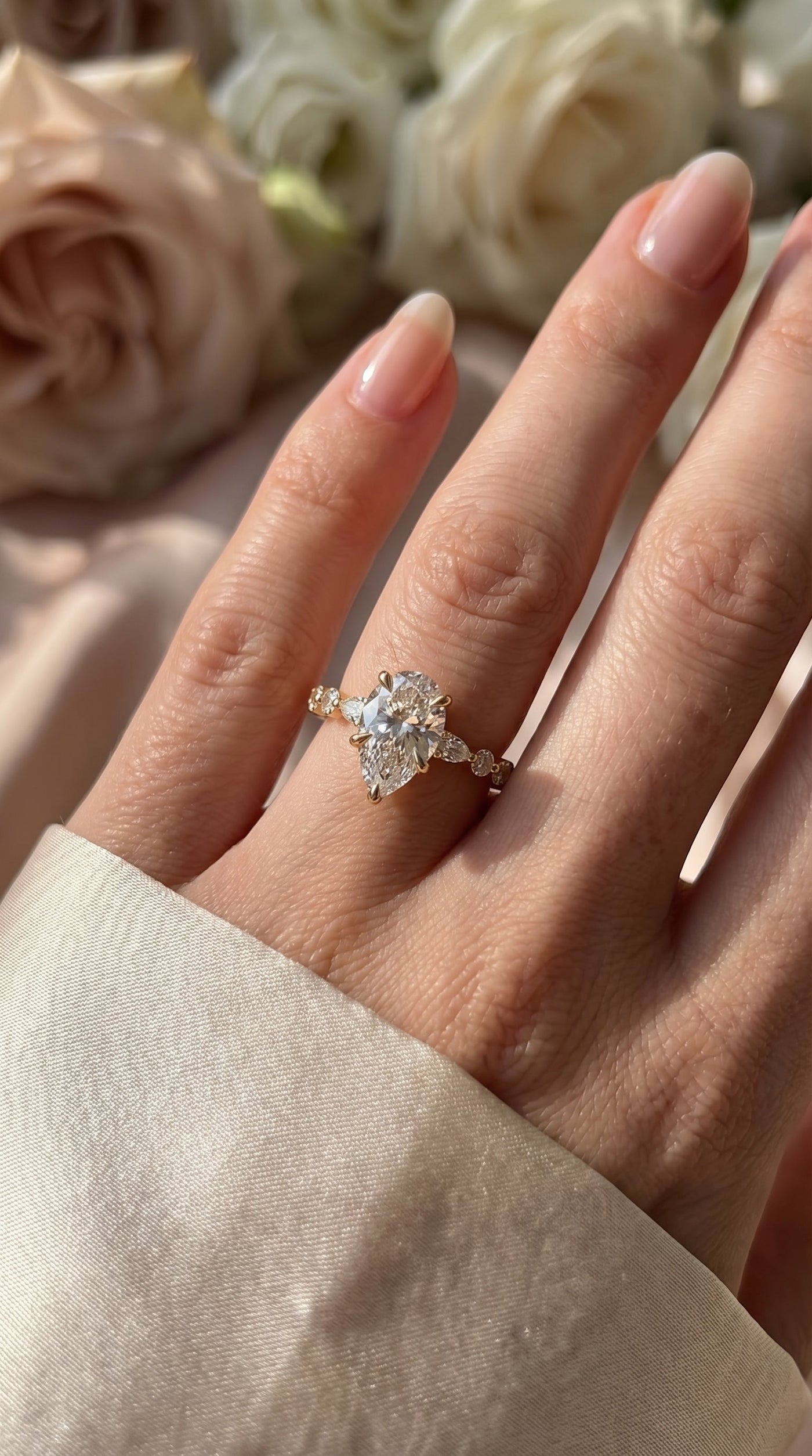 Elegant Pear Cut Diamond Side Stones Engagement Ring, view 2
