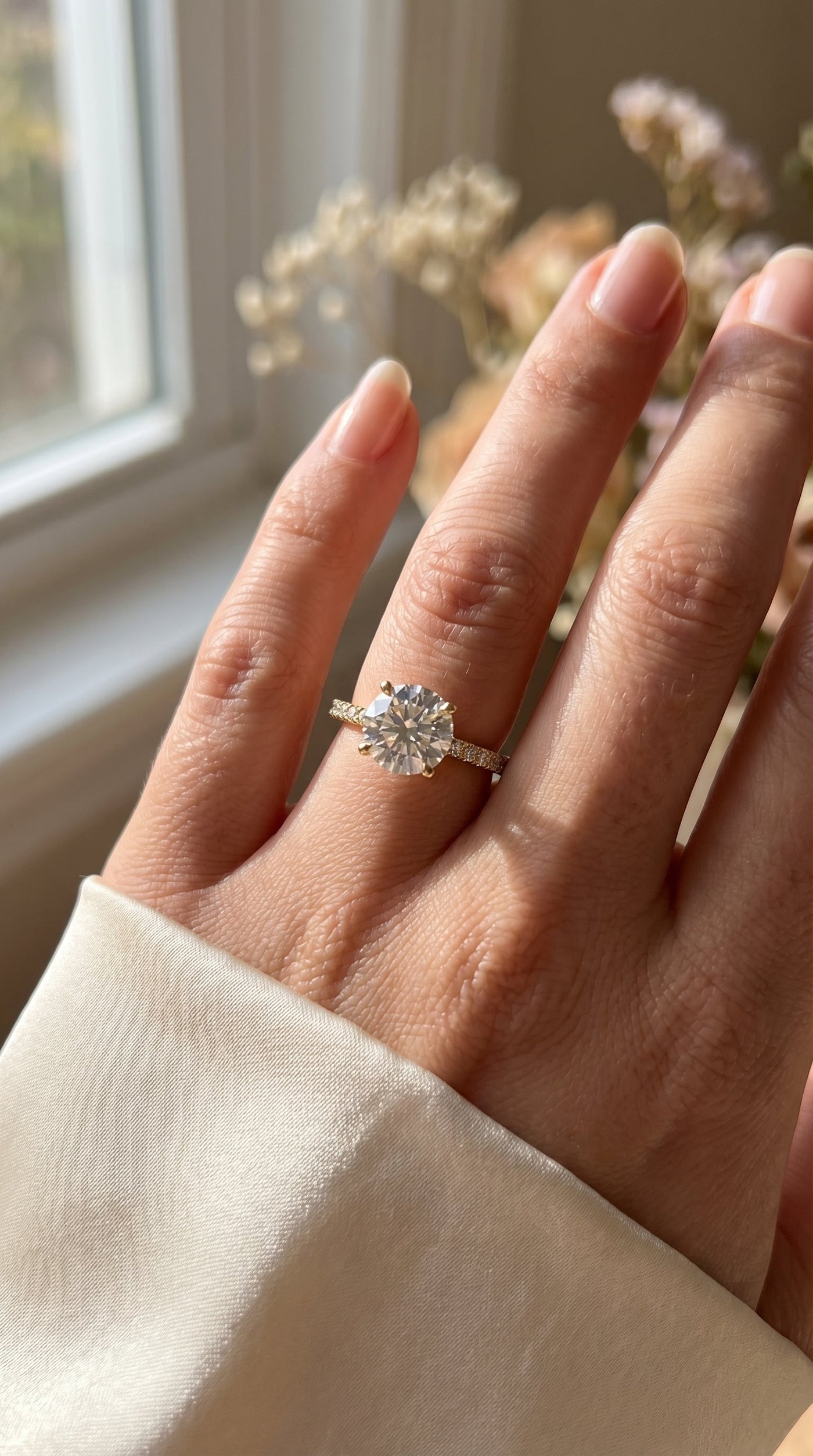 Elegant Round Cut Diamond Side Stone Ring with Pavé Band, view 2