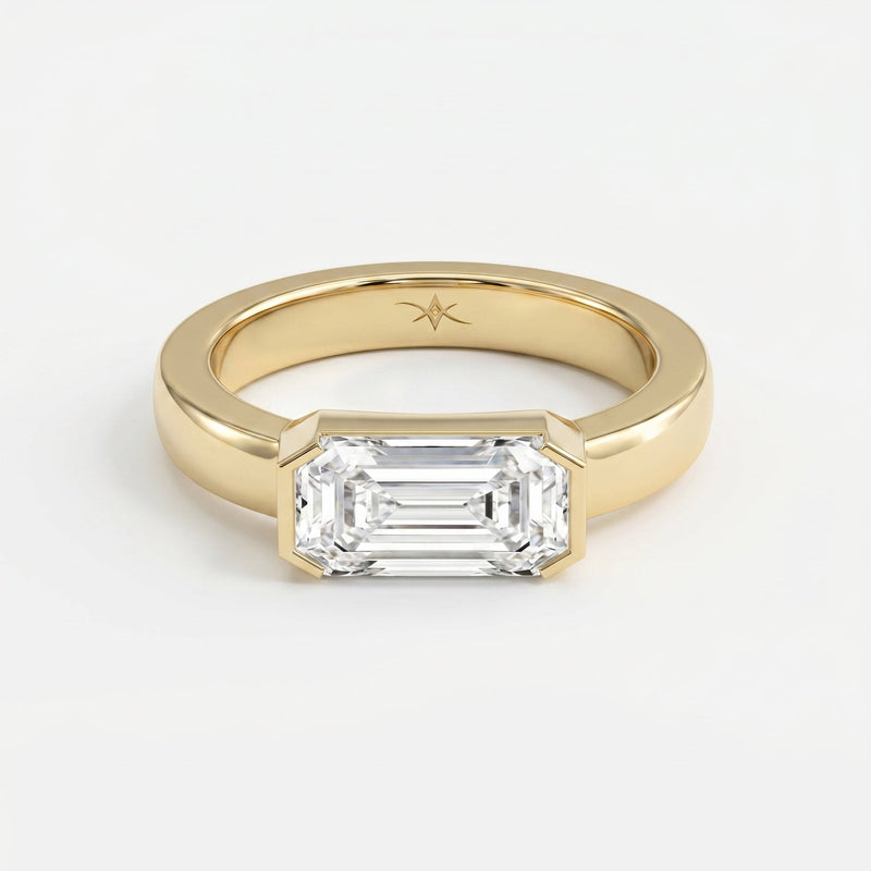 Bar Channel Setting Emerald Shape Diamond Solitaire Ring, view 1