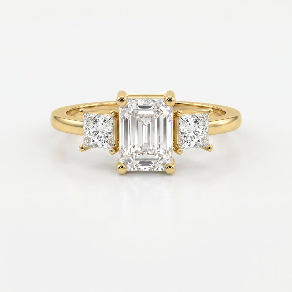 The Axis Trio Emerald Ring, view 1