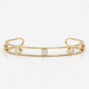 Minimalist Cuff Bracelet with Bezel Set Round Diamonds, view 1