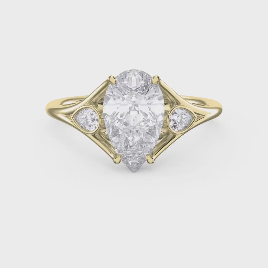Custom 4 Prong Diamond Ring with Bezel Set Pear Side Stones, product video