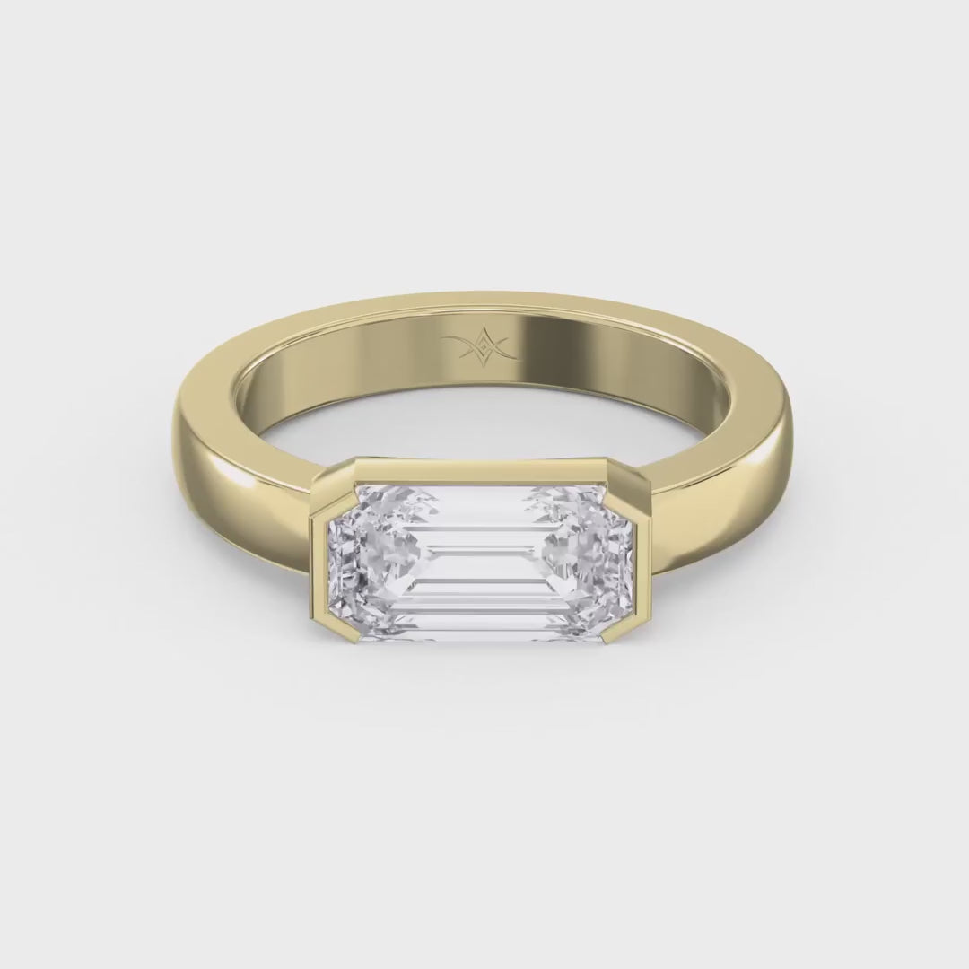 Bar Channel Setting Emerald Shape Diamond Ring, product video