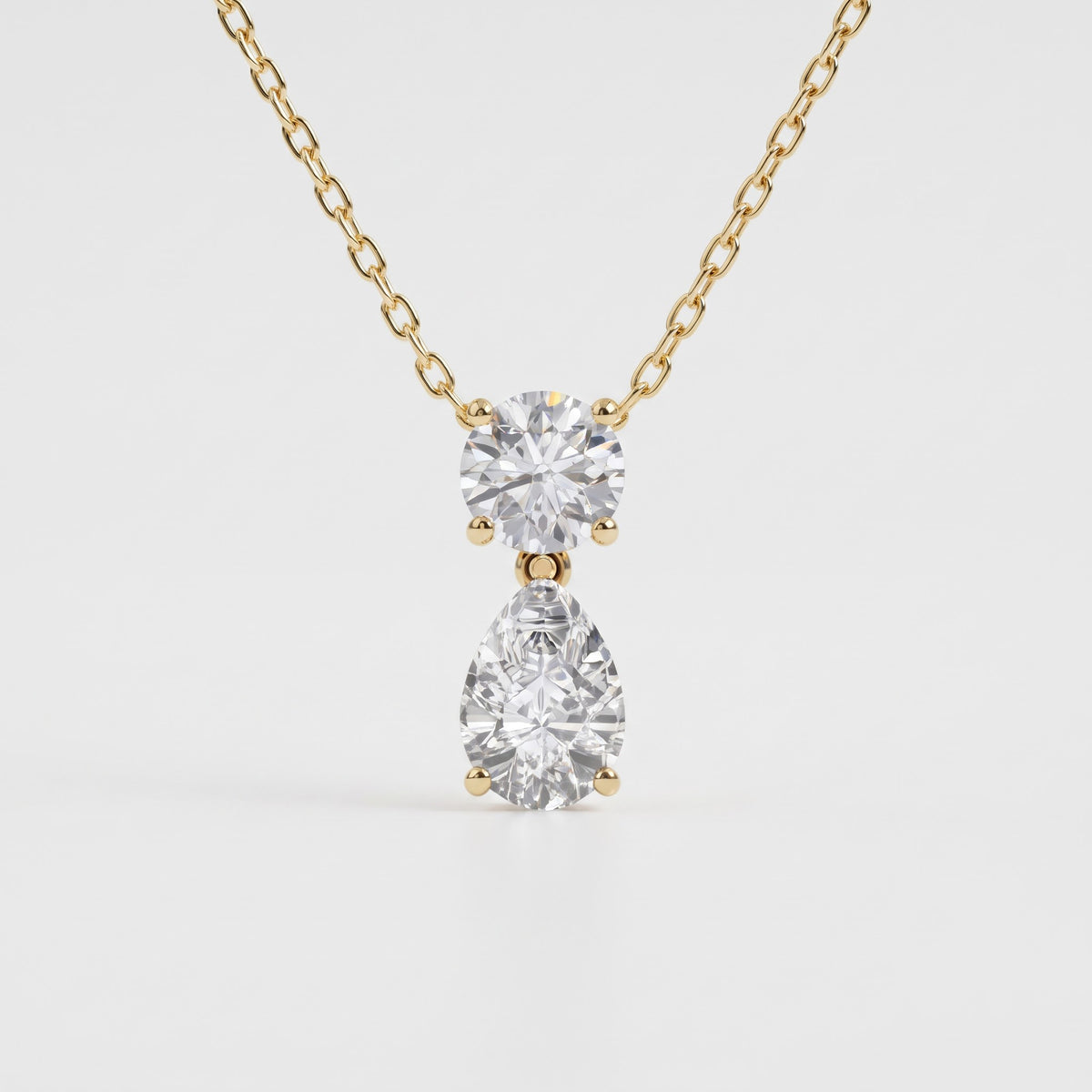 Two Stone Pear Round Dropdown Pendant